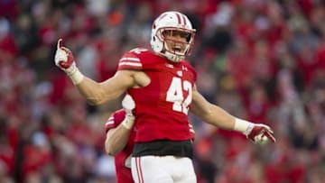 Nov 26, 2016; Madison, WI, USA; Wisconsin Badgers linebacker T.J. Watt (42) celebrates following a sack during the second quarter against the Minnesota Golden Gophers at Camp Randall Stadium. Mandatory Credit: Jeff Hanisch-USA TODAY Sports