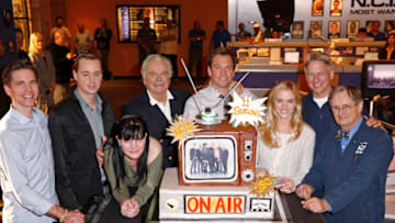 The Cast & Crew of NCIS celebrate the filming of their 250th episode. The 250th episode, "Dressed to Kill," airs Tuesday, March 4 (8:00-9:00 PM, ET/PT) on the CBS Television Network. Pictured left to right: Brian Dietzen, Sean Murray, Pauley Perrette, Robert Wagner, Michael Weatherly, Emily Wickersham, Mark Harmon and David McCallumPhoto: Monty Brinton/CBS©2014 CBS Broadcasting, Inc. All Rights Reserved