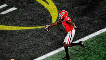ATLANTA, GA - JANUARY 08: Mecole Hardman #4 of the Georgia Bulldogs runs one yard for a touchdown during the second quarter against the Alabama Crimson Tide in the CFP National Championship presented by AT&T at Mercedes-Benz Stadium on January 8, 2018 in Atlanta, Georgia. (Photo by Scott Cunningham/Getty Images)