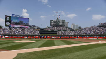 FanDuel MLB: CHICAGO, IL - JULY 04: An American flag on the field during the national anthem before the game between the Chicago Cubs and the Detroit Tigers on July 4, 2018 at Wrigley Field in Chicago, Illinois. (Photo by David Banks/Getty Images)