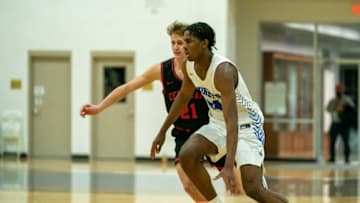 Gill St. Bernard's Mackenzie Mgbako (right) moves the ball against Hunterdon Central's Kevin Adams during their game on Thursday, Feb. 4, 2021.Gill St. Bernard's Hunterdon Central boys basketball