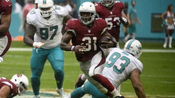 MIAMI GARDENS, FL - DECEMBER 11: David Johnson #31 of the Arizona Cardinals rushes during the 2nd quarter against the Miami Dolphins at Hard Rock Stadium on December 11, 2016 in Miami Gardens, Florida. (Photo by Eric Espada/Getty Images)