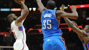 December 21, 2015; Los Angeles, CA, USA; Los Angeles Clippers guard Chris Paul (3) attempts a shot but is blocked by Oklahoma City Thunder forward Kevin Durant (35) during the second half at Staples Center. Thunder defeat the Clippers 100-99. Mandatory Credit: Gary A. Vasquez-USA TODAY Sports