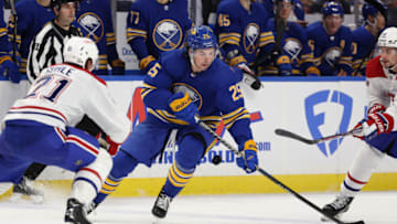 Oct 27, 2022; Buffalo, New York, USA; Buffalo Sabres defenseman Owen Power (25) looks to control the puck during the second period against the Montreal Canadiens at KeyBank Center. Mandatory Credit: Timothy T. Ludwig-USA TODAY Sports