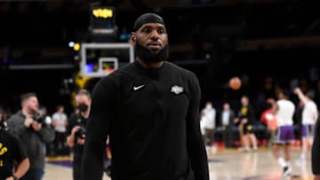 LOS ANGELES, CA - APRIL 01: LeBron James #6 of the Los Angeles Lakers walks off the court after warming up before the basketball game against the New Orleans Pelicans at Crypto.com Arena on April 1, 2022 in Los Angeles, California. NOTE TO USER: User expressly acknowledges and agrees that, by downloading and/or using this Photograph, user is consenting to the terms and conditions of the Getty Images License Agreement. (Photo by Kevork Djansezian/Getty Images)
