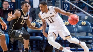 Jan 31, 2016; South Bend, IN, USA; Notre Dame Fighting Irish guard Demetrius Jackson (11) dribbles as Wake Forest Demon Deacons guard Bryant Crawford (13) defends in the second half at the Purcell Pavilion. The Fighting Irish won 85-62. Mandatory Credit: Matt Cashore-USA TODAY Sports