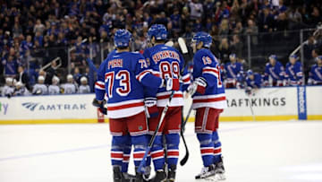 Nov 6, 2016; New York, NY, USA; New York Rangers right wing Jesper Fast (19) celebrates his goal with left wing Pavel Buchnevich (89) and teammates during the second period against the Winnipeg Jets at Madison Square Garden. Mandatory Credit: Danny Wild-USA TODAY Sports