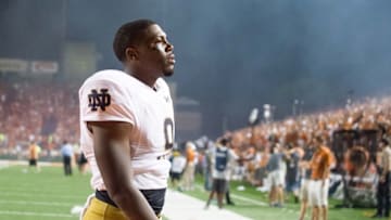 Sep 4, 2016; Austin, TX, USA; Notre Dame Fighting Irish quarterback Malik Zaire (9) leaves the field after Texas defeated Notre Dame 50-47 in double overtime at Darrell K. Royal-Texas Memorial Stadium. Mandatory Credit: Matt Cashore-USA TODAY Sports
