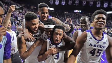 MANHATTAN, KS - FEBRUARY 05: Levi Stockard III #34, Austin Trice #23, Kamau Stokes #3 and Nigel Shadd #45 of the Kansas State Wildcats celebrate after defeating the Kansas Jayhawks on February 5, 2019 at Bramlage Coliseum in Manhattan, Kansas. (Photo by Peter G. Aiken/Getty Images)