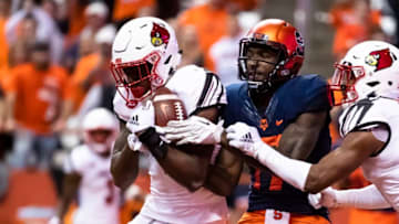 SYRACUSE, NY - NOVEMBER 09: P.J. Mbanasor #1 of the Louisville Cardinals intercepts a pass intended for Jamal Custis #17 of the Syracuse Orange in the end zone during the third quarter at the Carrier Dome on November 9, 2018 in Syracuse, New York. (Photo by Brett Carlsen/Getty Images)