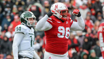 LINCOLN, NE - NOVEMBER 17: defensive lineman Carlos Davis #96 of the Nebraska Cornhuskers cheers a missed field goal as holder Brian Lewerke #14 of the Michigan State Spartans looks on in the first half at Memorial Stadium on November 17, 2018 in Lincoln, Nebraska. (Photo by Steven Branscombe/Getty Images)