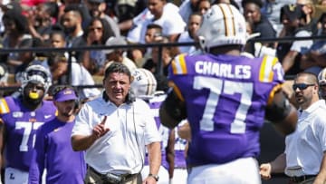NASHVILLE, TENNESSEE - SEPTEMBER 21: Head coach Ed Orgeron of the LSU Tigers waves his finger at Saahdiq Charles #77 during the first half of a game against the Vanderbilt Commodores at Vanderbilt Stadium on September 21, 2019 in Nashville, Tennessee. (Photo by Frederick Breedon/Getty Images)
