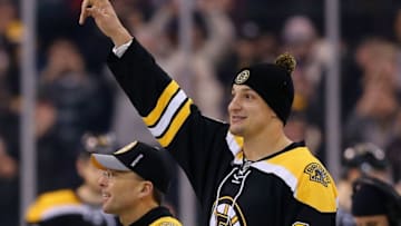 BOSTON, MA - FEBRUARY 07: Rob Gronkowski of the New England Patriots waves to fans before the game between the Boston Bruins and the New York Islanders at TD Garden on February 7, 2015 in Boston, Massachusetts. (Photo by Maddie Meyer/Getty Images)