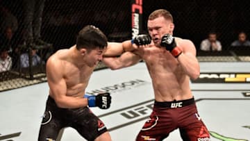 MOSCOW, RUSSIA - SEPTEMBER 15: (L-R) Jin Soon Son of South Korea punches Petr Yan of Russia in their bantamweight bout during the UFC Fight Night event at Olimpiysky Arena on September 15, 2018 in Moscow, Russia. (Photo by Jeff Bottari/Zuffa LLC/Zuffa LLC via Getty Images)