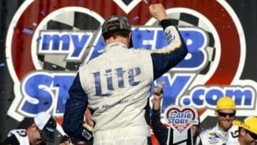 Sep 14, 2014; Joliet, IL, USA; NASCAR Sprint Cup Series driver Brad Keselowski (2) celebrates winning the MYAFIBSTORY.COM 400 at Chicagoland Speedway. Mandatory Credit: Jasen Vinlove-USA TODAY Sports