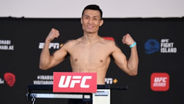 ABU DHABI, UNITED ARAB EMIRATES - OCTOBER 16: "The Korean Zombie" Chan Sung Jung of South Korea poses on the scale during the UFC Fight Night weigh-in on October 16, 2020 on UFC Fight Island, Abu Dhabi, United Arab Emirates. (Photo by Josh Hedges/Zuffa LLC via Getty Images)