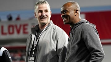Carolina Panthers head coach Frank Reich talks to Marvin Harrison Sr. during Ohio State football’s pro day at the Woody Hayes Athletic Center in Columbus on March 22, 2023.Football Ceb Osufb Pro Day