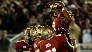 PASADENA, CA - JANUARY 06: Running back Devonta Freeman #8 of the Florida State Seminoles celebrates after a three-yard rush for a touchdown against the Auburn Tigers in the second quarter of the 2014 Vizio BCS National Championship Game at the Rose Bowl on January 6, 2014 in Pasadena, California. (Photo by Harry How/Getty Images)