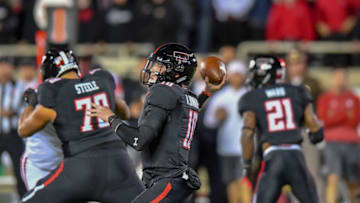LUBBOCK, TX - NOVEMBER 03: Alan Bowman #10 of the Texas Tech Red Raiders looks to pass the ball during the first half of the game against the Oklahoma Sooners on November 3, 2018 at Jones AT&T Stadium in Lubbock, Texas. (Photo by John Weast/Getty Images)
