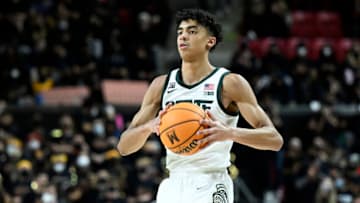 COLLEGE PARK, MARYLAND - FEBRUARY 01: Max Christie #5 of the Michigan State Spartans handles the ball against the Maryland Terrapins at Xfinity Center on February 01, 2022 in College Park, Maryland. (Photo by G Fiume/Getty Images)