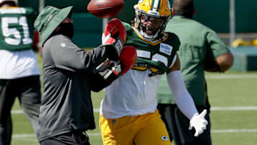 ASHWAUBENON, WISCONSIN - AUGUST 19: Christian Kirksey #58 of the Green Bay Packers participates in a drill during Green Bay Packers Training Camp at Ray Nitschke Field on August 19, 2020 in Ashwaubenon, Wisconsin. (Photo by Dylan Buell/Getty Images)