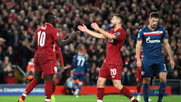 LIVERPOOL, ENGLAND - OCTOBER 24: Sadio Mane of Liverpool celebrates after scoring his team's fourth goal with Adam Lallana of Liverpool during the Group C match of the UEFA Champions League between Liverpool and FK Crvena Zvezda at Anfield on October 24, 2018 in Liverpool, United Kingdom. (Photo by Michael Regan/Getty Images)