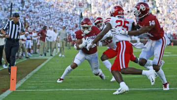 NORMAN, OK - SEPTEMBER 1: Half back Jeremiah Hall #10 of the Oklahoma Sooners scores against the Houston Cougars at Gaylord Family Oklahoma Memorial Stadium on September 1, 2019 in Norman, Oklahoma. (Photo by Brett Deering/Getty Images)