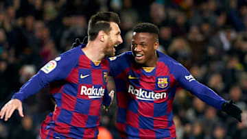 BARCELONA, SPAIN - JANUARY 19: Lionel Messi of Barcelona celebrates after scoring his team's first goal with his teammate Ansu Fati during the Liga match between FC Barcelona and Granada CF at Camp Nou on January 19, 2020 in Barcelona, Spain. (Photo by Quality Sport Images/Getty Images)