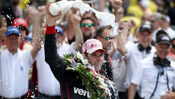 INDIANAPOLIS, IN - MAY 27: Will Power of Australia, driver of the #12 Verizon Team Penske Chevrolet celebrates by drinking milk after winning the 102nd Running of the Indianapolis 500 at Indianapolis Motorspeedway on May 27, 2018 in Indianapolis, Indiana. (Photo by Chris Graythen/Getty Images)