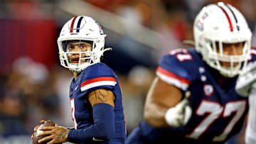 Oct 8, 2022; Tucson, Arizona, USA; Arizona Wildcats quarterback Jayden de Laura (7) drops back to pass during the first half against the Oregon Ducks at Arizona Stadium. Mandatory Credit: Mark J. Rebilas-USA TODAY Sports