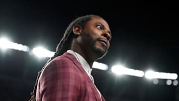 DENVER, COLORADO - OCTOBER 6: Former NFL cornerback and sideline personality Richard Sherman reacts after an interception by cornerback Stephon Gilmore #5 in the fourth quarter of a game against the Denver Broncos at Empower Field at Mile High on October 6, 2022 in Denver, Colorado. (Photo by Dustin Bradford/Getty Images)
