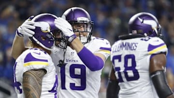 Nov 24, 2016; Detroit, MI, USA; Minnesota Vikings wide receiver Adam Thielen (19) celebrates with running back Matt Asiata (44) after a touchdown during the first quarter against the Detroit Lions at Ford Field. Mandatory Credit: Raj Mehta-USA TODAY Sports