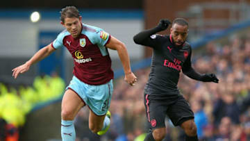 BURNLEY, ENGLAND - NOVEMBER 26: James Tarkowski of Burnley and Alexandre Lacazette of Arsenal during the Premier League match between Burnley and Arsenal at Turf Moor on November 26, 2017 in Burnley, England. (Photo by Alex Livesey/Getty Images)