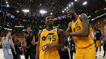 SALT LAKE CITY, UT - APRIL 27: Donovan Mitchell #45 and Derrick Favors #15 of the Utah Jazz react after game against the Oklahoma City Thunder in Game Six of the Western Conference Quarterfinals during the 2018 NBA Playoffs on April 27, 2018 at vivint.SmartHome Arena in Salt Lake City, Utah. Copyright 2018 NBAE (Photo by Melissa Majchrzak/NBAE via Getty Images)