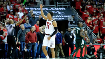 LOUISVILLE, KY - NOVEMBER 27: Dwayne Sutton #24 of the Louisville Cardinals celebrates after the 82-78 OT win over the Michigan State Spartans at KFC YUM! Center on November 27, 2018 in Louisville, Kentucky. (Photo by Andy Lyons/Getty Images)
