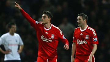 PRESTON, UNITED KINGDOM - JANUARY 03: Albert Riera of Liverpool celebrates scoring the opening goal with team mate Robbie Keane during the FA Cup sponsored by E.ON Third Round match between Preston North End and Liverpool at Deepdale Stadium on January 3, 2009 in Preston, England. (Photo by Alex Livesey/Getty Images)