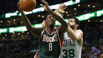 Nov 1, 2013; Boston, MA, USA; Milwaukee Bucks center Larry Sanders (8) shoots the ball against Boston Celtics center Vitor Faverani (38) during the first half at TD Garden. Mandatory Credit: Mark L. Baer-USA TODAY Sports