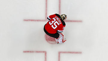 NEWARK, NJ - APRIL 18: New Jersey Devils goaltender Cory Schneider (35) during warm ups prior to the First Round Stanley Cup Playoff Game 4 between the New Jersey Devils and the Tampa Bay Lightning on April 18, 2018, at the Prudential Center in Newark, NJ. (Photo by Rich Graessle/Icon Sportswire via Getty Images)