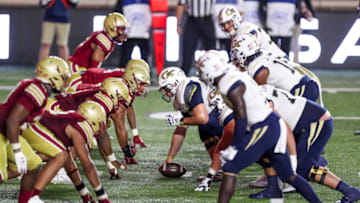 Oct 24, 2020; Chestnut Hill, Massachusetts, USA; Boston College Eagles and Georgia Tech Yellow Jackets at the line of scrimmage during the second half at Alumni Stadium. Mandatory Credit: Paul Rutherford-USA TODAY Sports