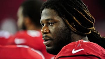 Aug 9, 2014; Glendale, AZ, USA; Arizona Cardinals offensive guard Jonathan Cooper (61) looks on during the second half against the Houston Texans at University of Phoenix Stadium. Mandatory Credit: Matt Kartozian-USA TODAY Sports