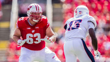 MADISON, WI - SEPTEMBER 09: Wisconsin Badger offensive lineman Michael Deiter (63) looks to block Florida Atlantic Owls defensive end Leighton McCarthy (13) during an college football game between the Florida Atlantic University Owls and the Wisconsin Badgers on September 9th, 2017, at Camp Randall Stadium in Madison, WI. (Photo by Dan Sanger/Icon Sportswire via Getty Images)