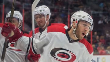 Nov 1, 2016; Ottawa, Ontario, CAN; Carolina Hurricanes defenseman Jacob Slavin (74) celebrates his goal scored in the first period against the Ottawa Senators at Canadian Tire Centre. Mandatory Credit: Marc DesRosiers-USA TODAY Sports