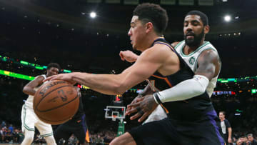 Kyrie Irving Devin Booker Phoenix Suns (Photo by Jim Davis/The Boston Globe via Getty Images)