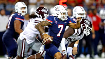 Sep 10, 2022; Tucson, Arizona, USA; Arizona Wildcats quarterback Jayden de Laura (7) runs the ball during the first half against the Mississippi State Bulldogs at Arizona Stadium. Mandatory Credit: Mark J. Rebilas-USA TODAY Sports