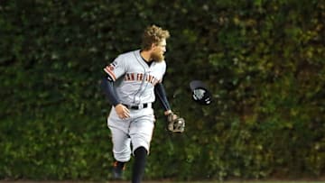 Oct 7, 2016; Chicago, IL, USA; San Francisco Giants right fielder Hunter Pence (8) loses his hat after making a catch for an out against the Chicago Cubs during the second inning during game one of the 2016 NLDS playoff baseball series at Wrigley Field. Mandatory Credit: Jerry Lai-USA TODAY Sports