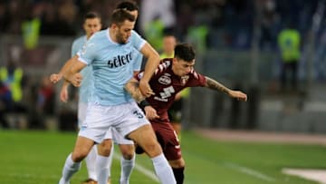 ROME, ROMA - DECEMBER 11: Stefan De Vrij of SS Lazio competes for the ball with Daniele Baselli of Torino FC during the Serie A match between SS Lazio and Torino FC at Stadio Olimpico on December 11, 2017 in Rome, Italy. (Photo by Marco Rosi/Getty Images)