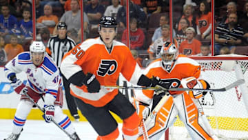 Sep 30, 2014; Philadelphia, PA, USA; Philadelphia Flyers defenseman Samuel Morin (50) chases the puck against the New York Rangers during the third period at Wells Fargo Center. The Flyers defeated the Rangers, 4-2. Mandatory Credit: Eric Hartline-USA TODAY Sports