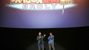 HOLLYWOOD, CALIFORNIA - DECEMBER 13: Christopher Sabat (L) and Funimation CEO Gen Fukunaga speak on stage at the premiere of 'Dragon Ball Super: Broly’ at TCL Chinese Theatre on December 13, 2018 in Hollywood, California. (Photo by Rich Fury/Getty Images for Funimation)