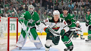 Apr 25, 2023; Dallas, Texas, USA; Dallas Stars goaltender Jake Oettinger (29) and defenseman Miro Heiskanen (4) and Minnesota Wild left wing Kirill Kaprizov (97) look for puck in the Stars zone during the third period in game five of the first round of the 2023 Stanley Cup Playoffs at American Airlines Center. Mandatory Credit: Jerome Miron-USA TODAY Sports