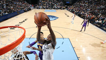 MEMPHIS, TN - DECEMBER 8: JaMychal Green #0 of the Memphis Grizzlies dunks the ball against the Los Angeles Lakers on December 8, 2018 at FedExForum in Memphis, Tennessee. NOTE TO USER: User expressly acknowledges and agrees that, by downloading and or using this photograph, User is consenting to the terms and conditions of the Getty Images License Agreement. Mandatory Copyright Notice: Copyright 2018 NBAE (Photo by Joe Murphy/NBAE via Getty Images)